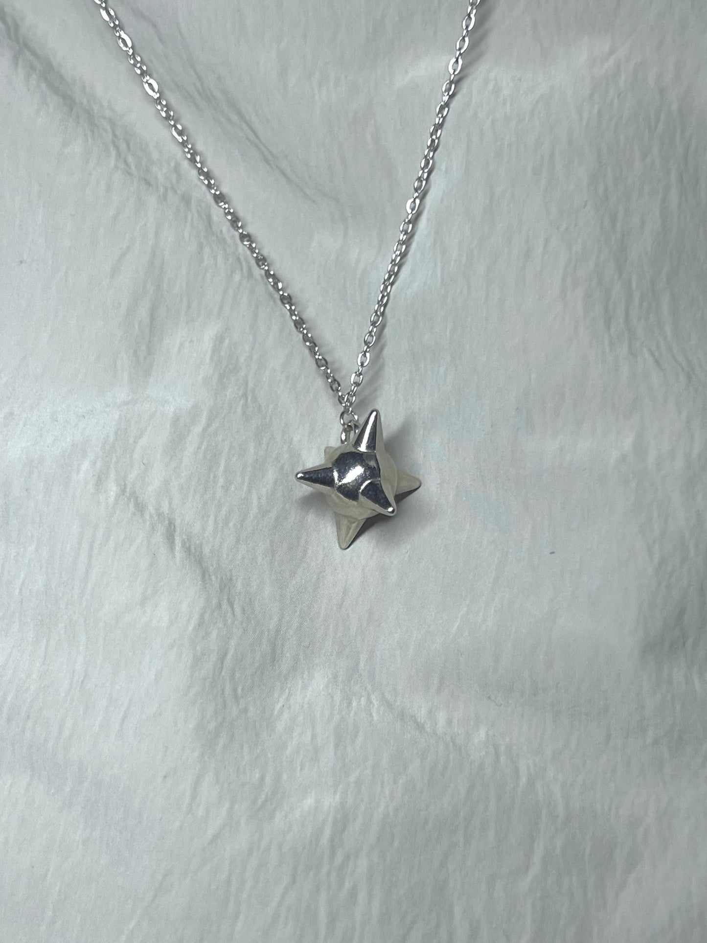 The Silver Spike Sphere - Caelis Cole